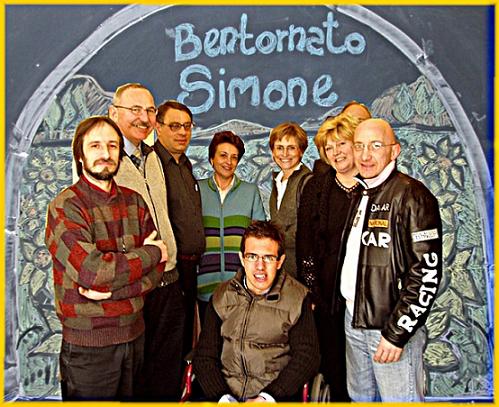 alcuni docenti del Calvino insieme a Simone Cadau, sfondo di campo di girasoli su lavagna. by Marco Mordini